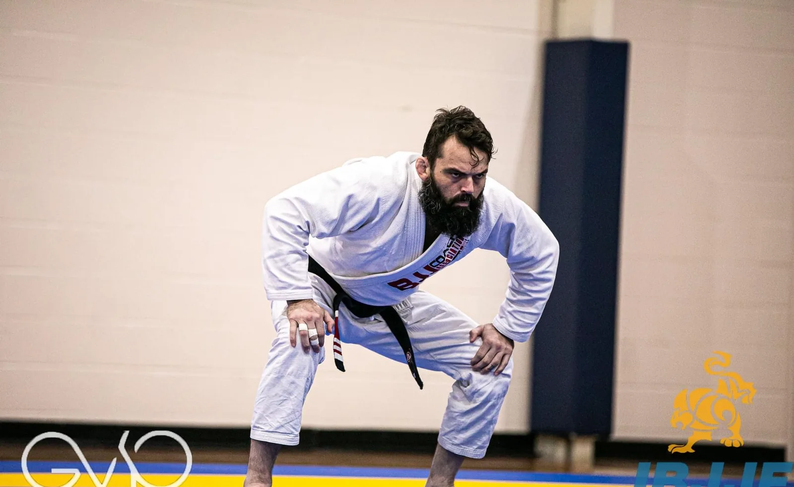 A ready stance on the academy mats