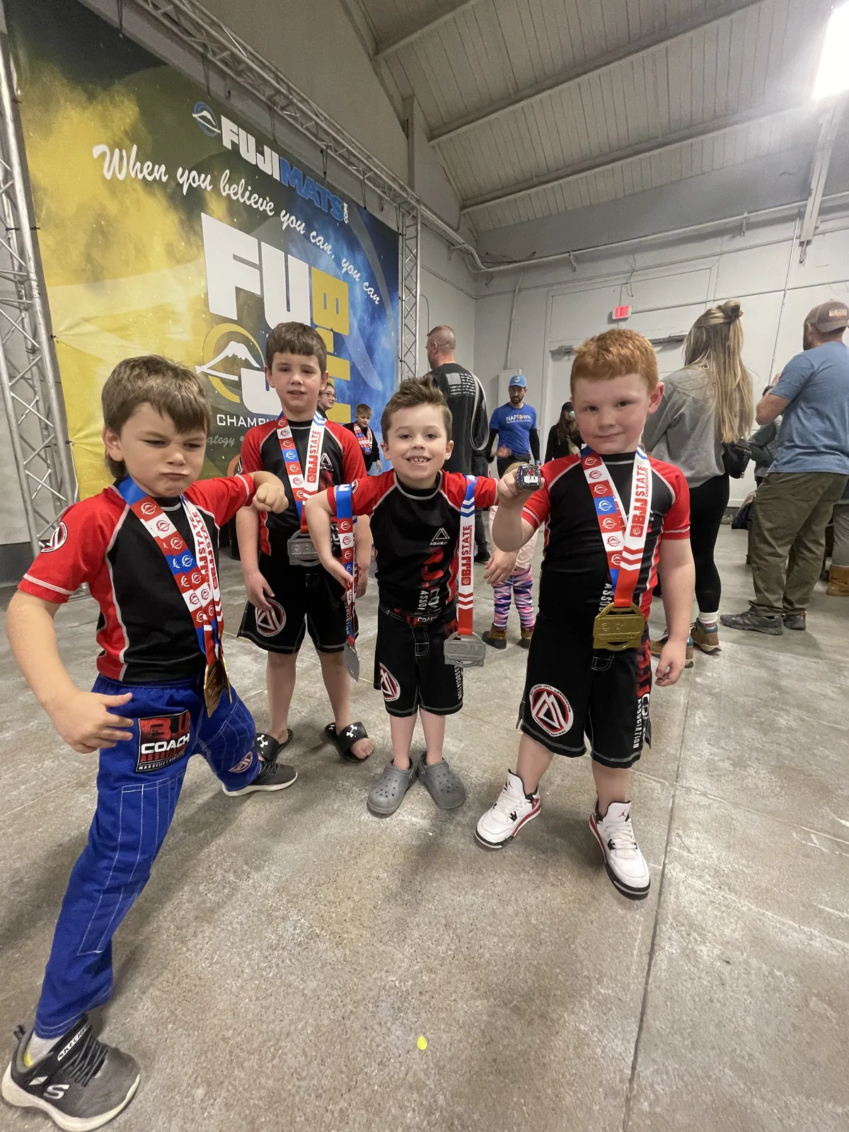 The kids team with their medals